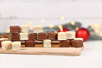 German Christmas sweets called 'Dominosteine'. Pralines consisting of gingerbread
