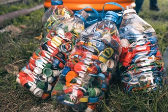 Detail of large quantity of colored plastic bottle caps. Recycled plastic bottle caps.Recycling Center