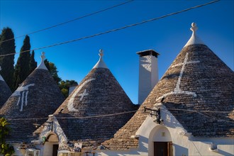 Trulli with symbols on the roof