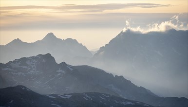 Silhouettes of mountains at sunset