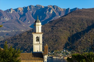 Church of Saints Fedele and Simone and Lake Lugano with Mountain in a Sunny Day in Vico Morcote