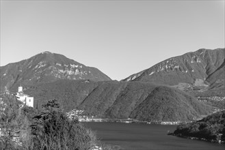 Church of Saints Fedele and Simone and Lake Lugano with Mountain in a Sunny Day in Vico Morcote