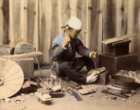 Japanese Shoemaker at Work