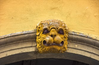 Keystone executed as a lion's head in an archway of a building in the historic old town of Quedlinburg
