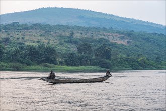 Man on his dugout canoe on the Congo river
