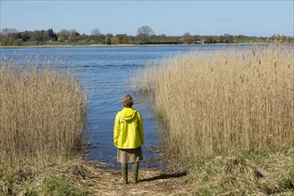 Woman standing on the bank of the Schlei