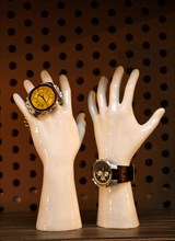 Porcelain hands with wristwatches