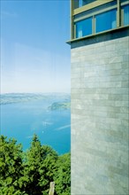 Hotel Five Stars Buergenstock over Lake Lucerne and Mountain in Sunny Day in Buergenstock