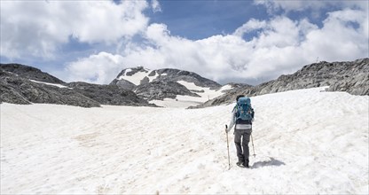 Mountaineer crossing snowfield