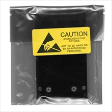Caution static sensitive devices packet over white