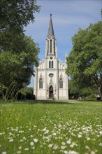 Neo-Gothic Catholic Church of St. Martin with flower meadow