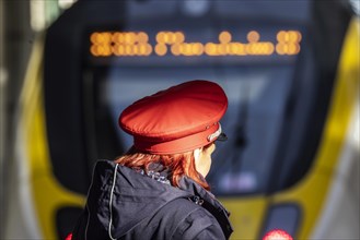 Deutsche Bahn AG employee with red cap