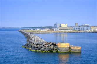 Industrial building structures in the harbour entrance of Roenne