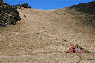Dilapidated shed on the small peninsula of Dyrholaey on the south coast of Iceland