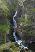 Waterfall on the Fjaora river flowing through the Fjaorargljufur