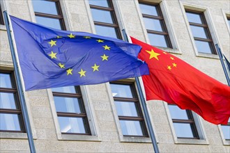 The flags of Europe and China fly in the wind in front of the Federal Foreign Office. Berlin