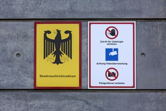 Sign with federal eagle on the building of the Federal Intelligence Service BND