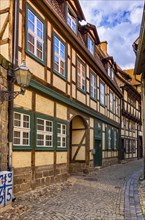 View through the narrow alley of hell in the historic old town of the World Heritage city of Quedlinburg