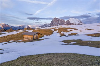 Alpine hut in the last sunlight