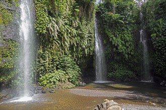 Benang Kelambu Waterfalls in tropical forest near the village Aik Berik