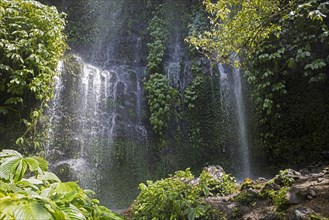 Benang Kelambu Waterfall in tropical forest near the village Aik Berik