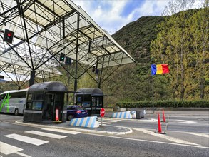 Border crossing from Andorra to Spain with Andorran flag