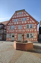 Mother-in-law fountain and half-timbered house