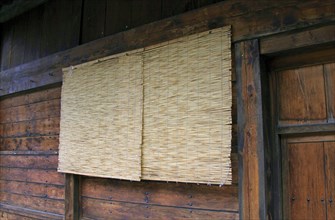 Bamboo blind of wooden house at Narai-juku traditional small town in Nagano Japan