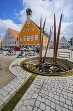 Market square with town hall and kinetic artwork