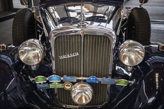 Close-up with brand emblem of a Maybach classic car type SW38 year of construction 1938