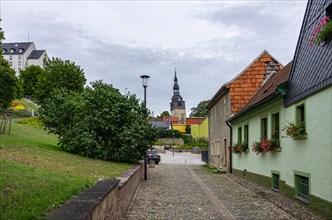 Street view in the upper town with a view to the 56 m high tower of the Oberkirche
