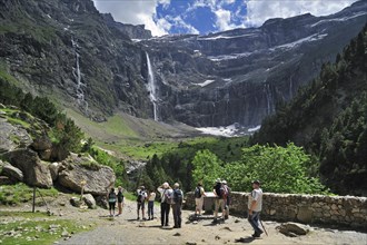 Tourists visiting the Cirque de Gavarnie and the Gavarnie Falls