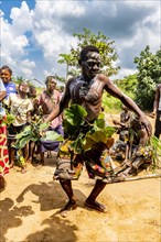 Pygmy man dancing