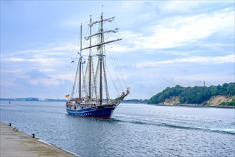 The three-masted topsail schooner Santa Barbara Anna sails into Sassnitz town harbour as part of the Sassnitz Sail 2022