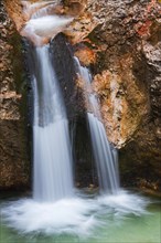 Waterfall in the river Almbach running through the Almbachklamm canyon in the Berchtesgaden Alps
