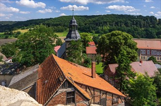 View from the west tower of the Romanesque monastery ruins of St. Wigbert on surrounding structures of the village of Goellingen near Bad Frankenhausen in Kyffhaeuserland