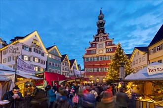 Medieval market and Christmas market against a backdrop of historic houses
