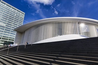 White concert hall with staircase