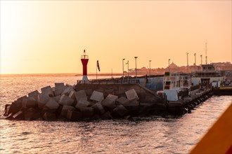 Tenerife ferry heading to Hierro or La Gomera from Los Cristianos. Beautiful sunset in the port