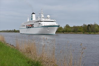 Cruise ship Deutschland sails from Kiel to Brunsbuettel in the Kiel Canal