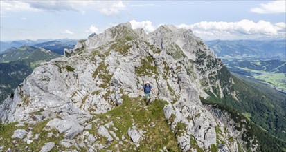 Mountaineer on a ridge trail