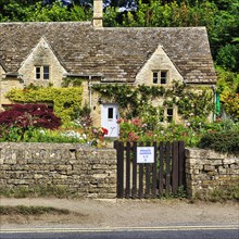 Typical stone house with front garden