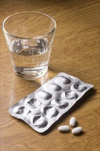 Medicines with a glass of water
