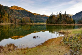 The Weitsee lake in the Chiemgau Alps nature reserve in autumn