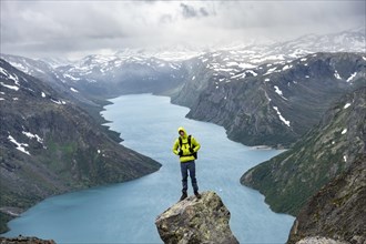 Climber standing on rocks