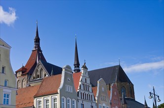 View over Hanseatic gables and roofs as well as St. Mary's Church at Neuer Markt in the Hanseatic City of Rostock
