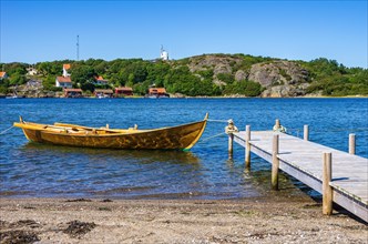 Single rowing boat at a jetty on the north beach of the South Koster Island