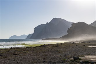 Backlight of Mughsail beach and the mountains