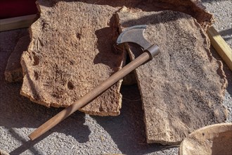 Antique axe to cut the bark of the cork oak to extract the cork