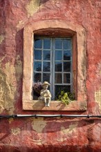 Window with small figure